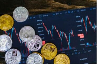 Multiple cryptocurrencies displayed against a live trading chart, reflecting trends for the best crypto to invest in 2024 and 2025 for high potential returns.