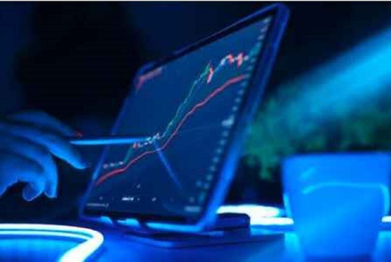 "A person analyzing liquidity in trading on a tablet, showing a digital chart with upward and downward price trends, representing the dynamic movement of assets.